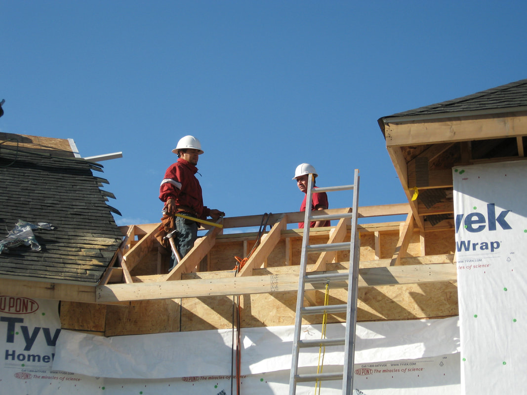 Volunteers working on the roof